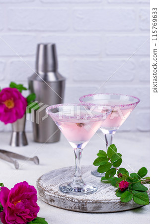 Pink martini cocktail with rose syrup Pink martini cocktail with rose syrup 115769633