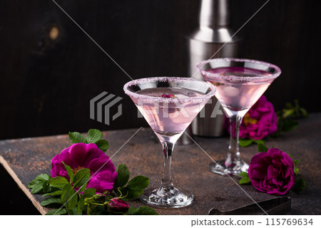 Pink martini cocktail with rose syrup Pink martini cocktail with rose syrup 115769634