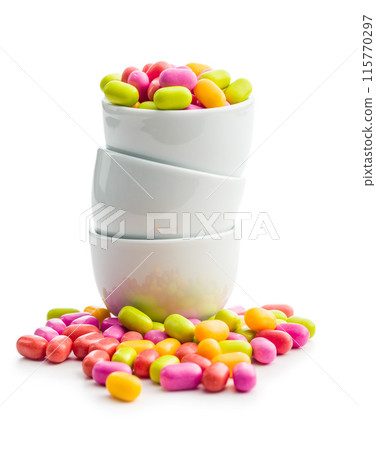 Colorful hard mint Candies in bowl Isolated On White Background Colorful hard mint Candies in bowl Isolated On White Background 115770297