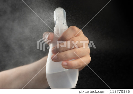 Plastic spray bottle front view 115770386