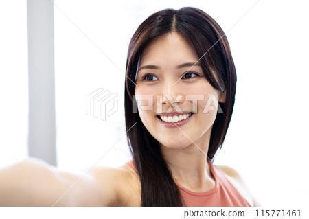 Young woman doing yoga (opening arms, refreshing, stretching, beauty) Young woman doing yoga (opening arms, refreshing, stretching, beauty) 115771461
