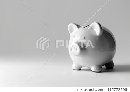 A piggy bank filled with a large amount of money on a table 115772596