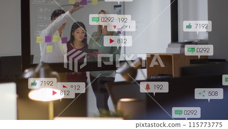 Image of notification bars over diverse coworkers discussing strategy on sticky notes 115773775