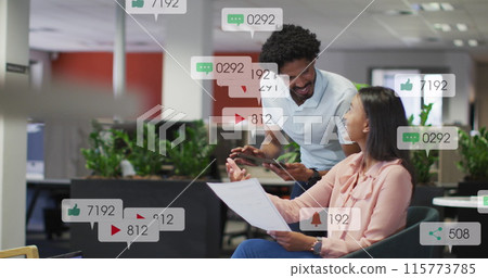 Image of changing numbers, icons in notification bars, diverse coworkers discussing reports Image of changing numbers, icons in notification bars, diverse coworkers discussing reports 115773785