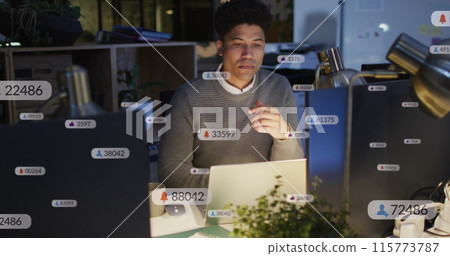 Image of multiple notification bars over biracial man analyzing and preparing reports on laptop 115773787