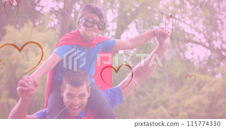Image of hearts falling over caucasian man and his son playing together in garden Image of hearts falling over caucasian man and his son playing together in garden 115774330