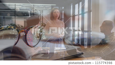 Image of glasses over diverse group of business people 115774398