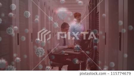 Image of virus cells over caucasian workers in server room Image of virus cells over caucasian workers in server room 115774679