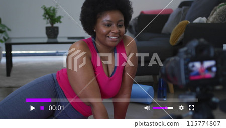 Image of social media screen over african american woman making image blog and exercising Image of social media screen over african american woman making image blog and exercising 115774807