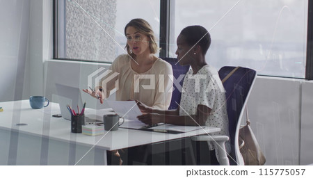 Image of financial data processing over diverse business people at office Image of financial data processing over diverse business people at office 115775057