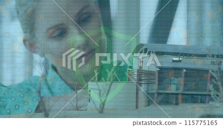 Image of data processing over caucasian businesswoman working at office 115775165