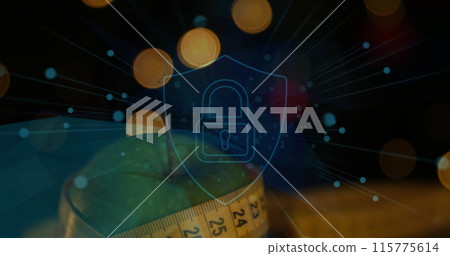 Image of padlock and shield icon with lens flares over granny smith apple and measuring tape 115775614