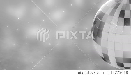 Image of mirror disco ball spinning over spots of lights on grey background 115775668