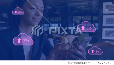 Image of cloud icons with growing number over biracial businesswoman using smartphone 115775759