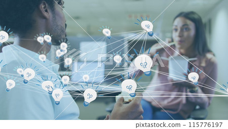 Image of network of bulb icons over diverse male and female colleagues having snacks at office Image of network of bulb icons over diverse male and female colleagues having snacks at office 115776197