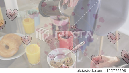 Image of heart emojis over caucasian woman pouring coffee Image of heart emojis over caucasian woman pouring coffee 115776298