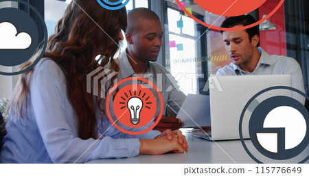 Image of multiple icons over diverse coworkers discussing reports on laptop in office Image of multiple icons over diverse coworkers discussing reports on laptop in office 115776649