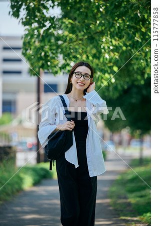 Young woman commuting 115777858