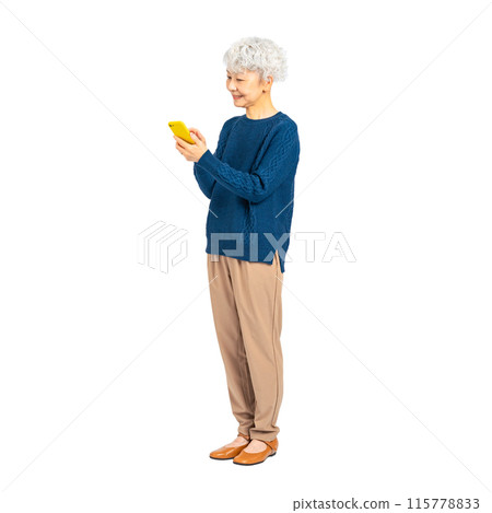 Smiling senior woman using a smartphone - Full-body photo PNG with transparent background precisely cut out by hand Smiling senior woman using a smartphone - Full-body photo PNG with transparent background precisely cut out by hand 115778833