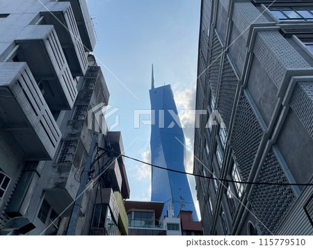 The blue sky seen through the gaps between the buildings in Kuala Lumpur The blue sky seen through the gaps between the buildings in Kuala Lumpur 115779510