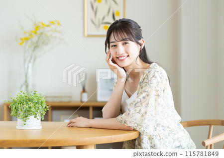 A young woman relaxing at home A young woman relaxing at home 115781849