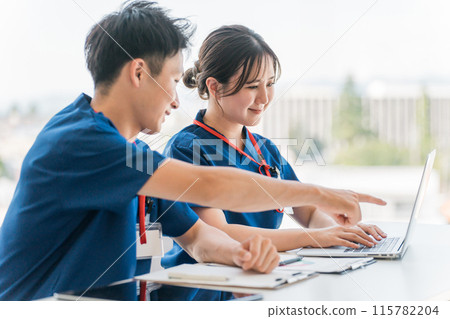 Young men and women including nurses, physiotherapists, caregivers, doctors and interns holding meetings, conferences and handovers 115782204