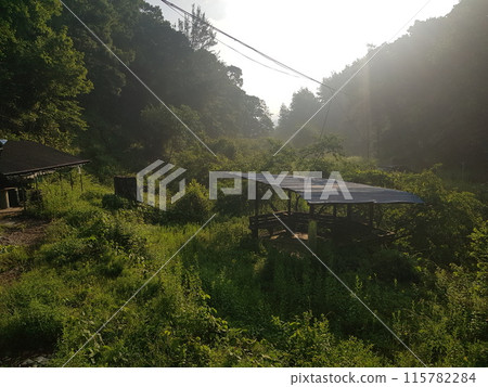 a small house on a construction site a small house on a construction site 115782284