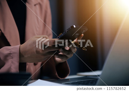 Work using mobile phone typing computer mobile chat laptop contact us at workplaces, planning ideas investors internet searching, ideas connecting people. 115782652