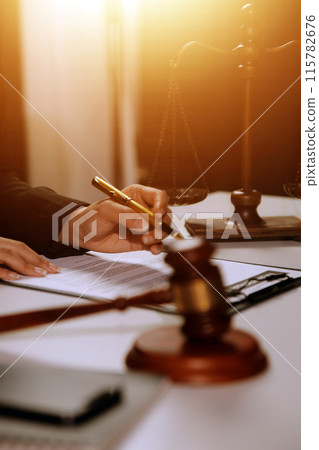Law theme, gavel or mallet of the judge, lawyer enforcement officers, evidence-based cases taken into account in the court abount business, legislation. 115782676