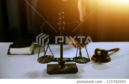 Law theme, gavel or mallet of the judge, lawyer enforcement officers, evidence-based cases taken into account in the court abount business, legislation. 115782683