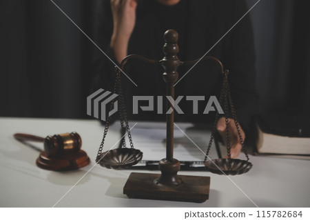 Law theme, gavel or mallet of the judge, lawyer enforcement officers, evidence-based cases taken into account in the court abount business, legislation. 115782684