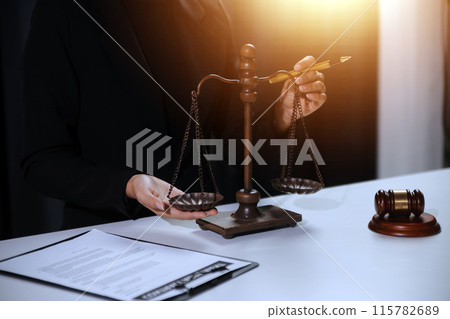 Law theme, gavel or mallet of the judge, lawyer enforcement officers, evidence-based cases taken into account in the court abount business, legislation. 115782689