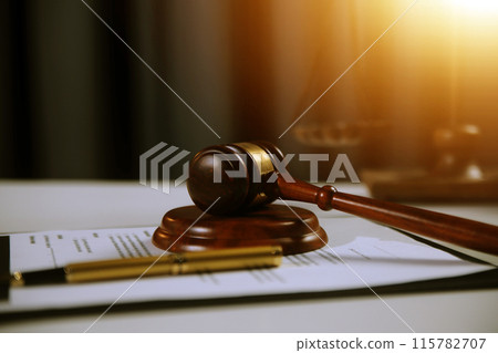 Law theme, gavel or mallet of the judge, lawyer enforcement officers, evidence-based cases taken into account in the court abount business, legislation. 115782707
