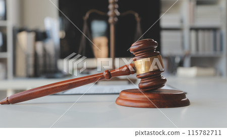 Law theme, gavel or mallet of the judge, lawyer enforcement officers, evidence-based cases taken into account in the court abount business, legislation. Law theme, gavel or mallet of the judge, lawyer enforcement officers, evidence-based cases taken into account in the court abount business, legislation. 115782711