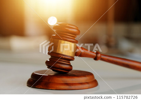 Law theme, gavel or mallet of the judge, lawyer enforcement officers, evidence-based cases taken into account in the court abount business, legislation. Law theme, gavel or mallet of the judge, lawyer enforcement officers, evidence-based cases taken into account in the court abount business, legislation. 115782726