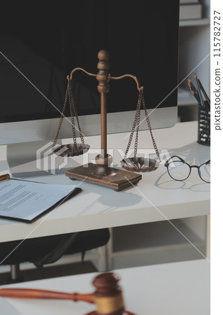 Law theme, gavel or mallet of the judge, lawyer enforcement officers, evidence-based cases taken into account in the court abount business, legislation. 115782727