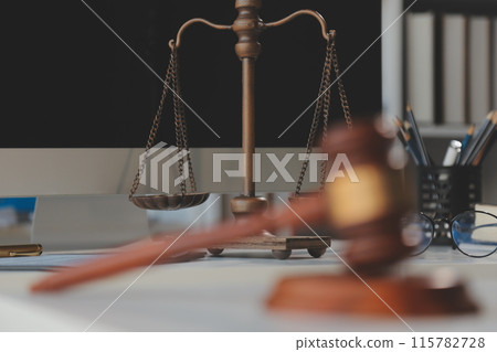Law theme, gavel or mallet of the judge, lawyer enforcement officers, evidence-based cases taken into account in the court abount business, legislation. 115782728