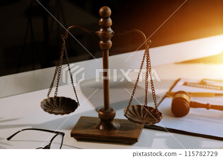 Law theme, gavel or mallet of the judge, lawyer enforcement officers, evidence-based cases taken into account in the court abount business, legislation. 115782729