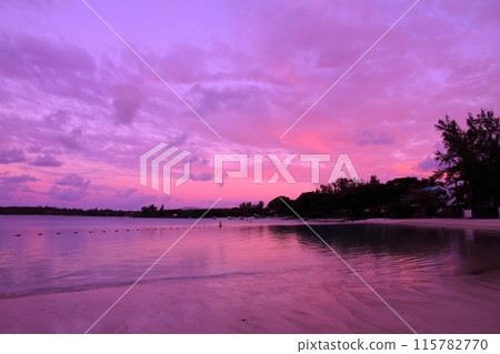 Sunrise from the beach in Blue Bay, located on the southeast coast of Mauritius, an island nation also known as the Lady of the Indian Ocean 115782770