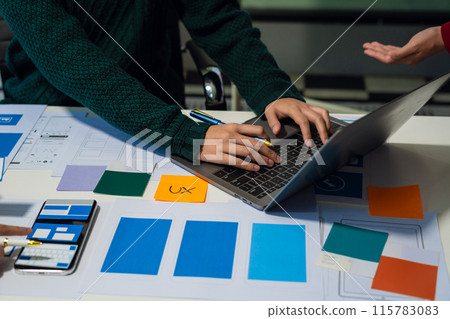 UX developer and ui designer brainstorming about mobile app interface wireframe design with customer breif and color code, User experience concept.. UX developer and ui designer brainstorming about mobile app interface wireframe design with customer breif and color code, User experience concept.. 115783083