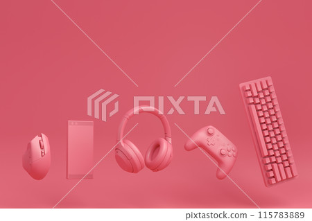 Modern home office setup featuring keyboard, gaming controllers and headphones 115783889