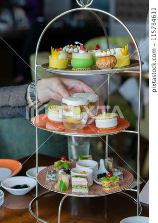 Luxury hotel afternoon tea 115784611
