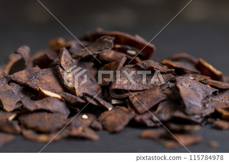 roasted and dried in chocolate and cocoa coconut pulp 115784978