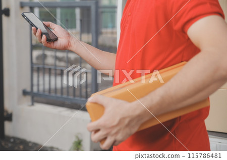 Asian delivery express courier young man use giving boxes to woman customer he wearing protective face mask at front home Asian delivery express courier young man use giving boxes to woman customer he wearing protective face mask at front home 115786481