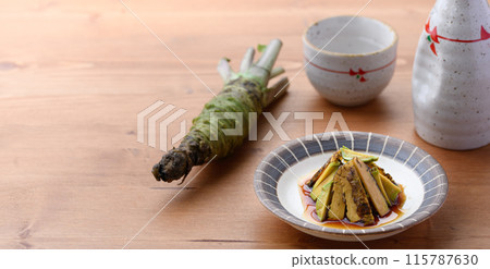 A spicy dish of real wasabi (fresh wasabi) marinated in soy sauce. The crunchy texture of the wasabi makes this dish interesting. A spicy dish of real wasabi (fresh wasabi) marinated in soy sauce. The crunchy texture of the wasabi makes this dish interesting. 115787630