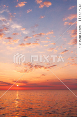 Sunrise seen from the deck of a ferry heading to Hokkaido 115787938