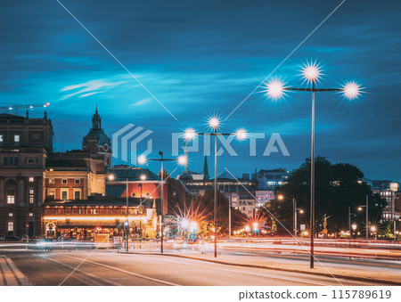 Stockholm, Sweden. Scenic Skyline View Of Famous Tower Of Stockholm City Hall And St. Clara Or Saint Klara Church. Popular Destination Scenic View In Sunset Twilight Dusk Lights. Evening Lighting 115789619