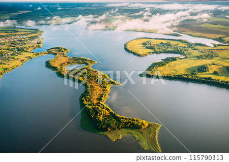 Aerial View Of Residential Area With Houses In Countryside. Top View Of Island From High Attitude In Autumn Morning. Bird's Eye View Of Old Lyepyel Cityscape Skyline Aerial View Of Residential Area With Houses In Countryside. Top View Of Island From High Attitude In Autumn Morning. Bird's Eye View Of Old Lyepyel Cityscape Skyline 115790313