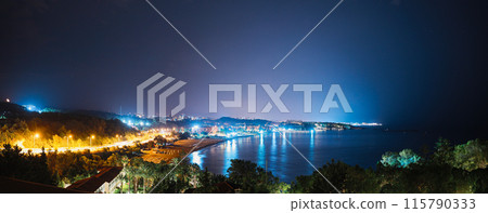 Popular Touristic Coastline. Turkish Riviera Or Turquoise Coast. Night View On Hotels Mediterranean Coast Of Antalya And Alanya. Travel To Turkey. Favorable Climate, Warm Sea, Mountainous Popular Touristic Coastline. Turkish Riviera Or Turquoise Coast. Night View On Hotels Mediterranean Coast Of Antalya And Alanya. Travel To Turkey. Favorable Climate, Warm Sea, Mountainous 115790333