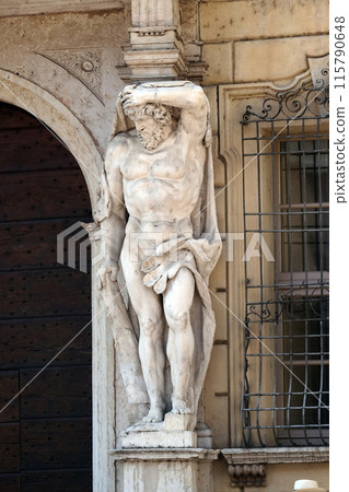Statue of Hercules at the entrance to the 18th century Palazzo Vescovile (Bishops Palace) in the historical center of Mantua, Italy Statue of Hercules at the entrance to the 18th century Palazzo Vescovile (Bishops Palace) in the historical center of Mantua, Italy 115790648